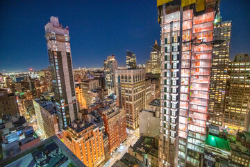 NEW YORK CITY - DECEMBER 7, 2018: Night skyline of Midtown Manhattan, aerial view at night