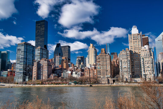 Manhattan skyline on a sunny morning from Roosevelt Island Park