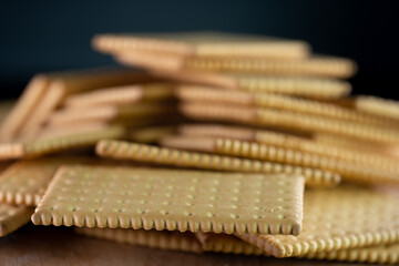 Galette cookies on a black background