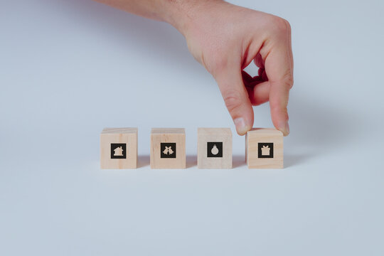 Set of Christmas icons on wooden cubes. White background