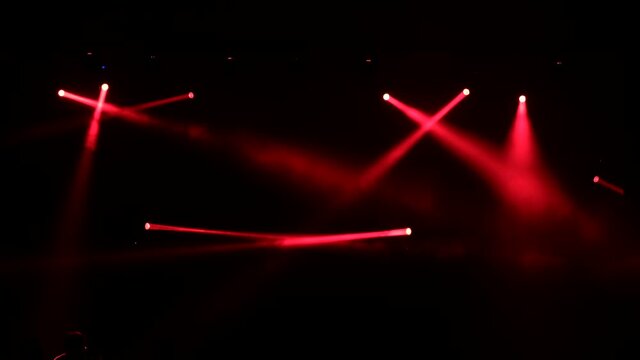 Stage colorful lighting beams spotlight and smoke of events show or concerts