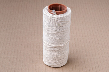 White cord for garters of household items.