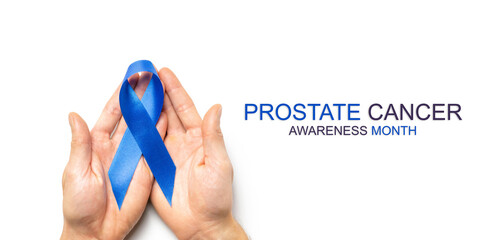 Prostate awareness. Blue ribbon in hands isolated on white background. Awareness prostate cancer of...