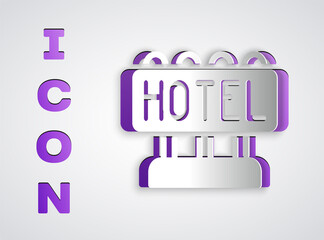 Paper cut Signboard outdoor advertising with text Hotel icon isolated on grey background. Paper art style. Vector.