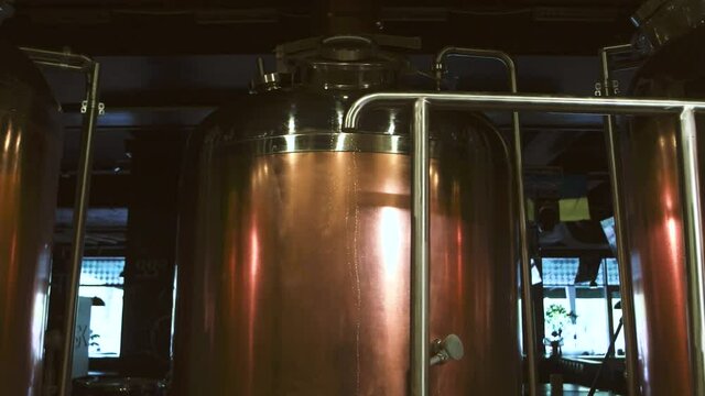 Close up copper brewery vessels. Red copper beer equipment for brewhouse, draft beer, craft beer.