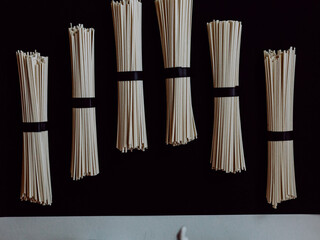 japanese udon noodles isolated on a black background