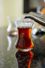 Making turkish tea called Chai at home.
