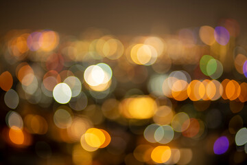 Bokeh  light in the fastival in the evening. Abstract bokeh yellow light of the city in night time.