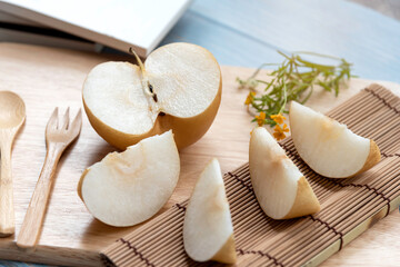 Chinese pear friut, Nan shui pear is a special of pear,put on wooden table in color cloth.