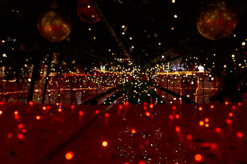 the new year's red and yellow garland and balls looks like universe