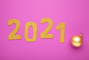 Happy New Year. Symbol from number 2021 on pink background.