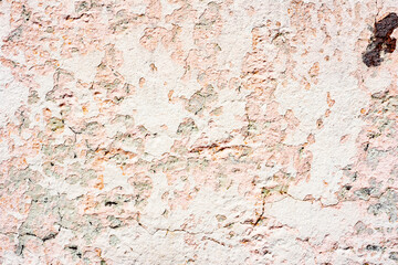 Texture of a concrete wall with cracks and scratches which can be used as a background