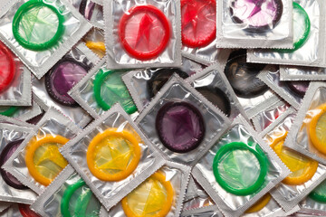 Colorful condoms background.