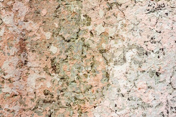 Texture of a concrete wall with cracks and scratches which can be used as a background