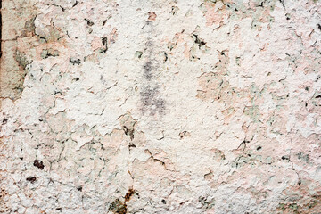 Texture of a concrete wall with cracks and scratches which can be used as a background