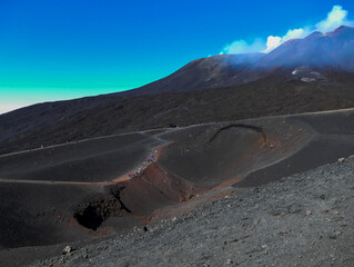 People on excursion on mount Etna, Sicily, Italy
