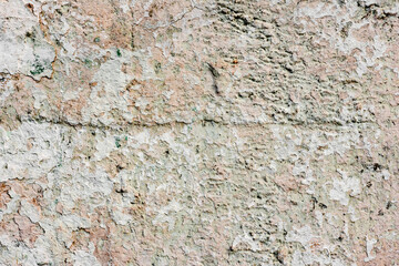 Texture of a concrete wall with cracks and scratches which can be used as a background