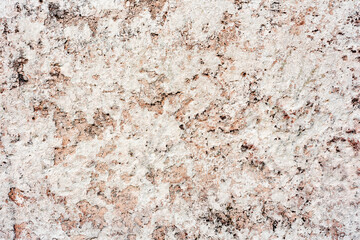 Texture of a concrete wall with cracks and scratches which can be used as a background