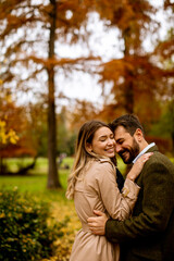 Young couple in the autumn park