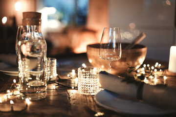 Dining table decorated for an elegant evening dinner party