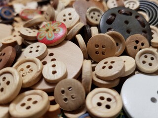 Multicolored wooden buttons for sewing