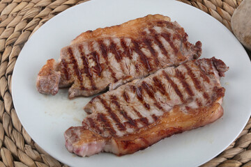 piece of meet cooked at the barbecue