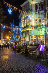 Naklejka na ściany i meble Evening street in Strassbourg, France, Christmas decoration and lights