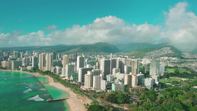 Honolulu cityscape, aerial view of Waikiki skyline, Ala Wai canal and Kapi olani Regional Park. Oahu is the third largest Hawaiian island. Hawaii, United States.