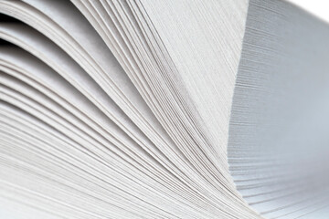 Macro shot of open book. Education and study concept. Close-up of opened book pages. Macro view of book pages. Edges of open paper book sheets close-up