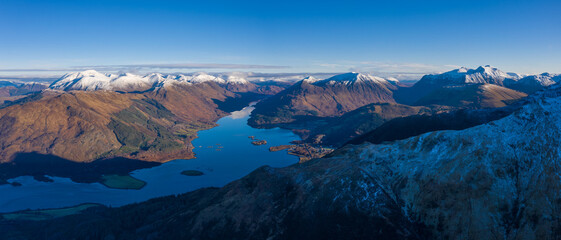 aerial view of loch leven and glen coe village near fort william in the argyll region of the highlands of scotland shot from above glenachulish © Andy Morehouse