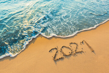 new year's eve welcome new year Goodbye 2021 on the beach on nature background