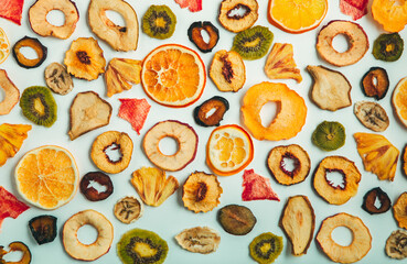 Organic Healthy Assorted Dried Fruit Mix close up. Dried fruit snacks. dried apples, mango, feijoa, dried apricots, prunes top view