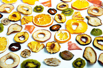 Organic Healthy Assorted Dried Fruit Mix close up. Dried fruit snacks. dried apples, mango, feijoa, dried apricots, prunes top view