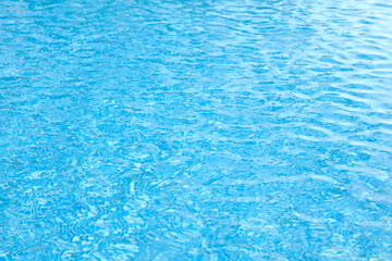 Clear and clean water in swimming pool for background.