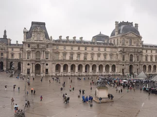 Deurstickers   View from the second floor of the Louvre to the rainy Place du Carrousel © aleks