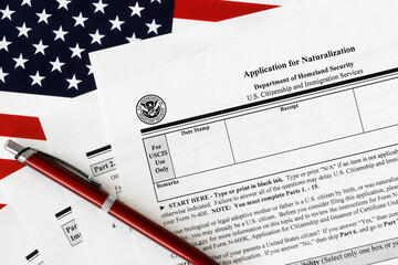 close-up of n-400 form. application for naturalization topview, on a background of United States...