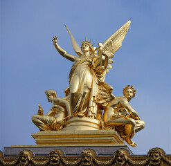 Fototapeta na wymiar Sculpture Harmony on the roof of the opera Garnier
