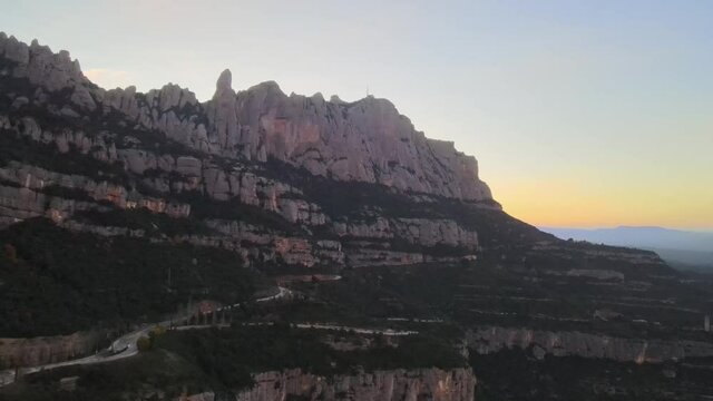 Aerial views of Montserrat peaks, a mountain range in Catalonia during the sunset