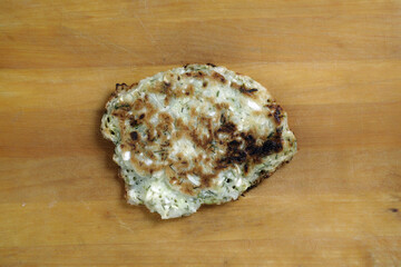 Pancakes with vegetable filling grilled on the barbecue during outdoor recreation