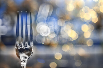 abstract background, restaurant concept blurred background evening food fork, knife, cutlery, table setting