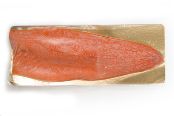 Fillet of red fish in vacuum packing. Isolate. Horizontal format. View from above. Copyspace