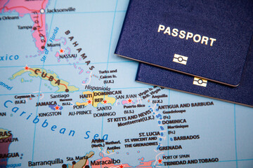 Passports on a map of the world. caribbean. Dominican Republic