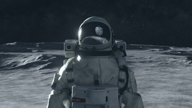 An astronaut stands on the surface of the moon among craters against the backdrop of the planet earth. Reflection of the earth in the glass of the spacesuit helmet. Ultra realistic 3d animation