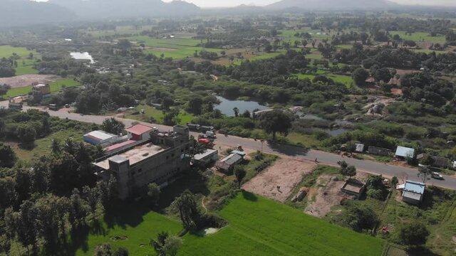 Beautiful green landscape cut through by Tindivanam highway in India