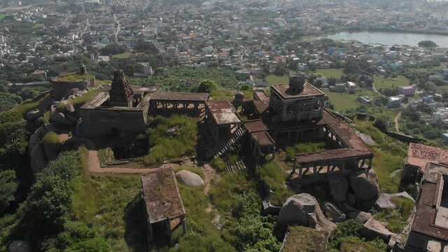 Close up look at Krishnagiri fort covered in grass and moss on a beautiful sunny day