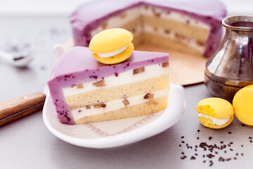 mousse cake of currant and biscuit with macaroon and coffee