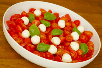 tomato salad with mozzarella balls and basil