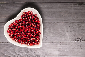 grains garnet in dish on black