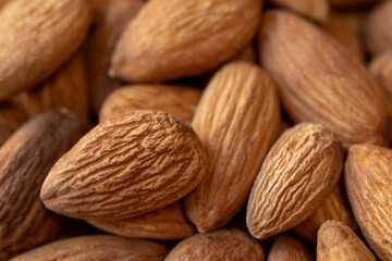 Almonds nuts close-up. Natural background for healthy eating concept