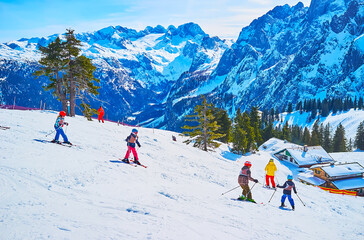 Children on downhill, Zwieselalm mountain, Gosau, Austria